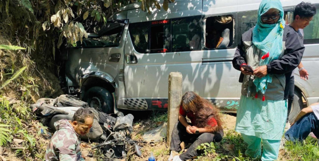 Two dead, 14 hurt in microbus-scooter collision