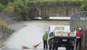 Heavy rains in southern Japan cause flooding and mudslides, and leave several people missing
