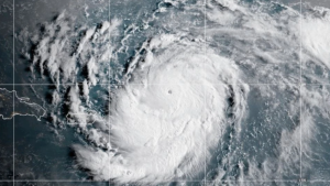 Downgraded Hurricane Erin lashes Caribbean with rain